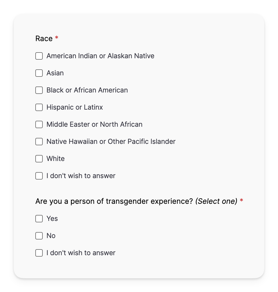 A portion of a job application's demographics section. The race and transgender status questions are required, but offer a "I don't wish to answer" option.